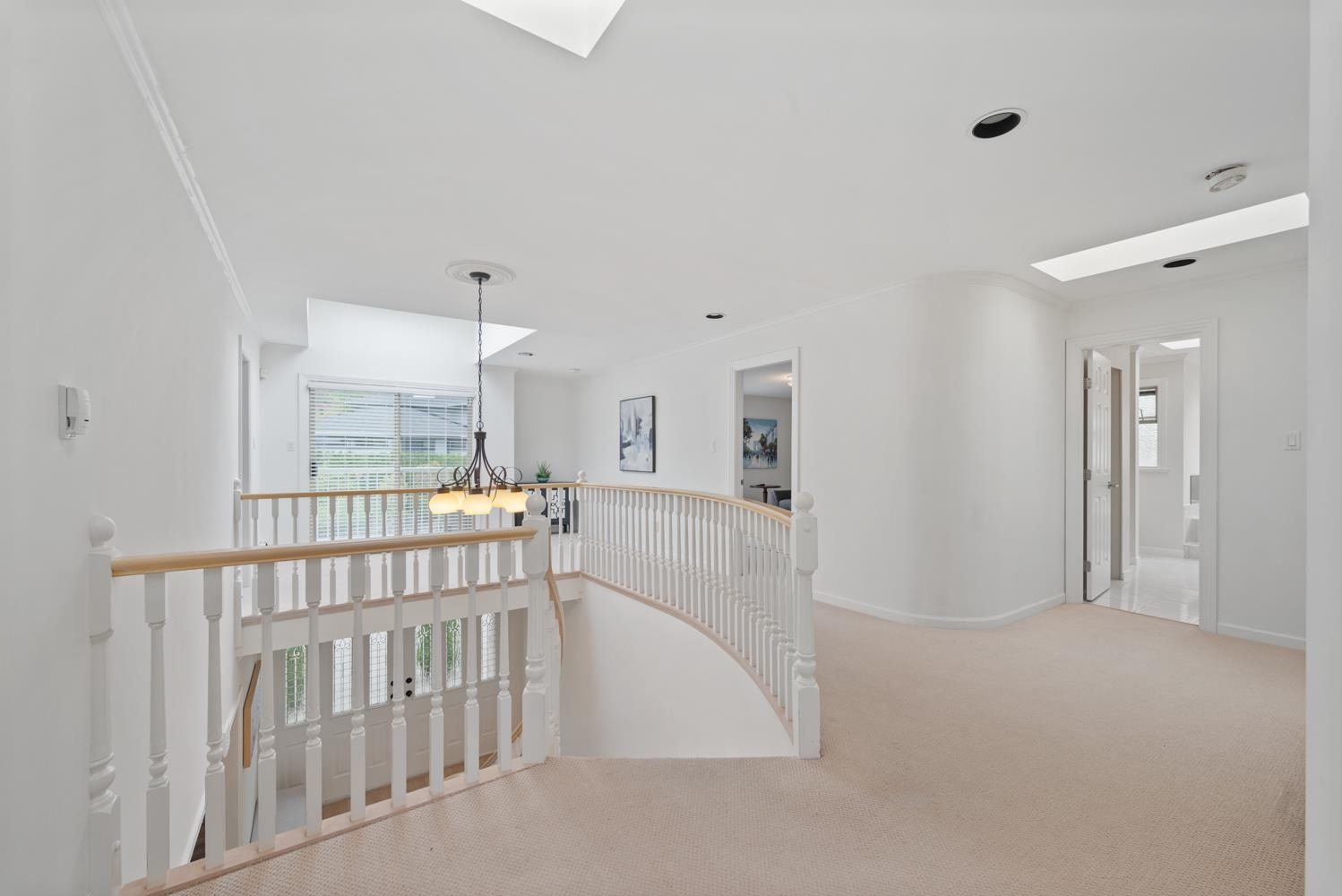Upper hall above the curved staircase